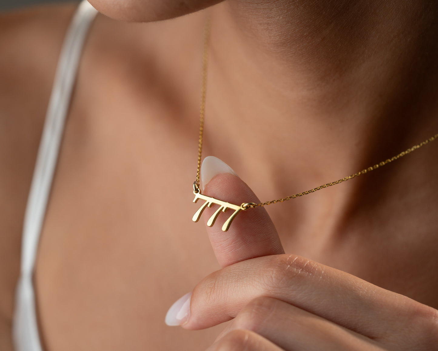 777 number pendant close-up