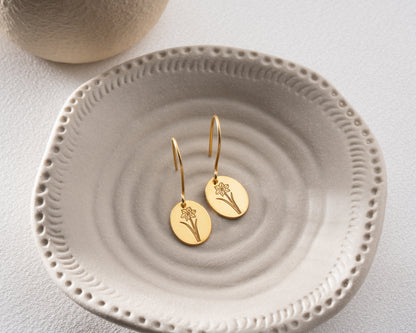 birth flower earrings display