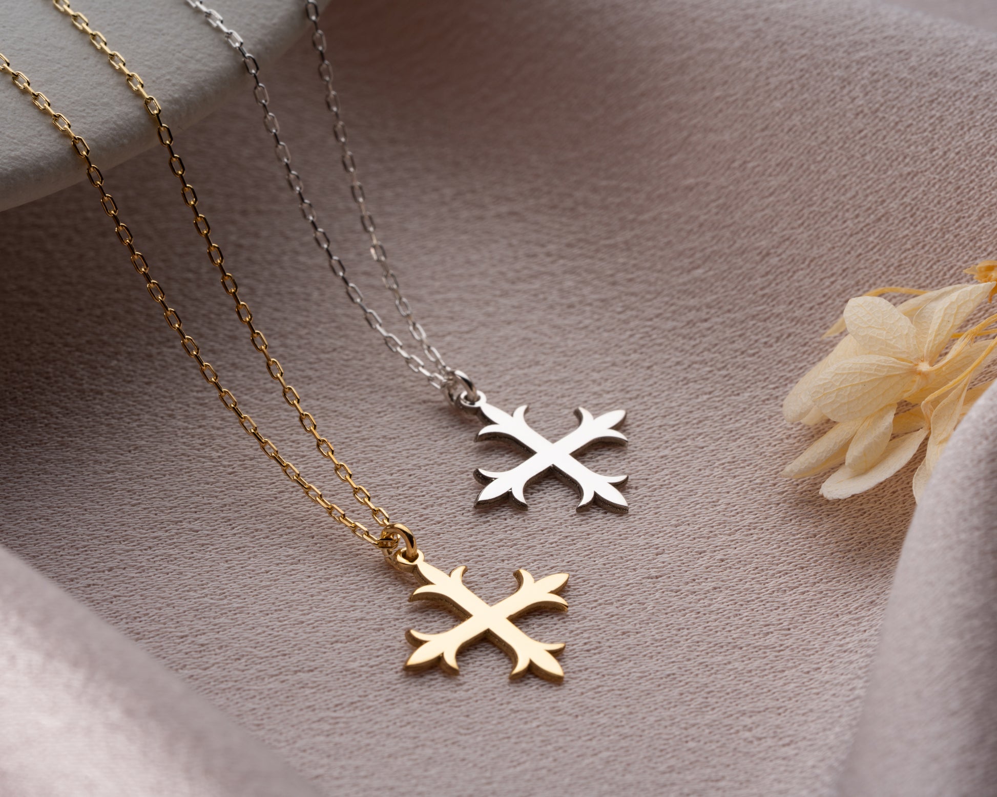 Budded cross necklace detail