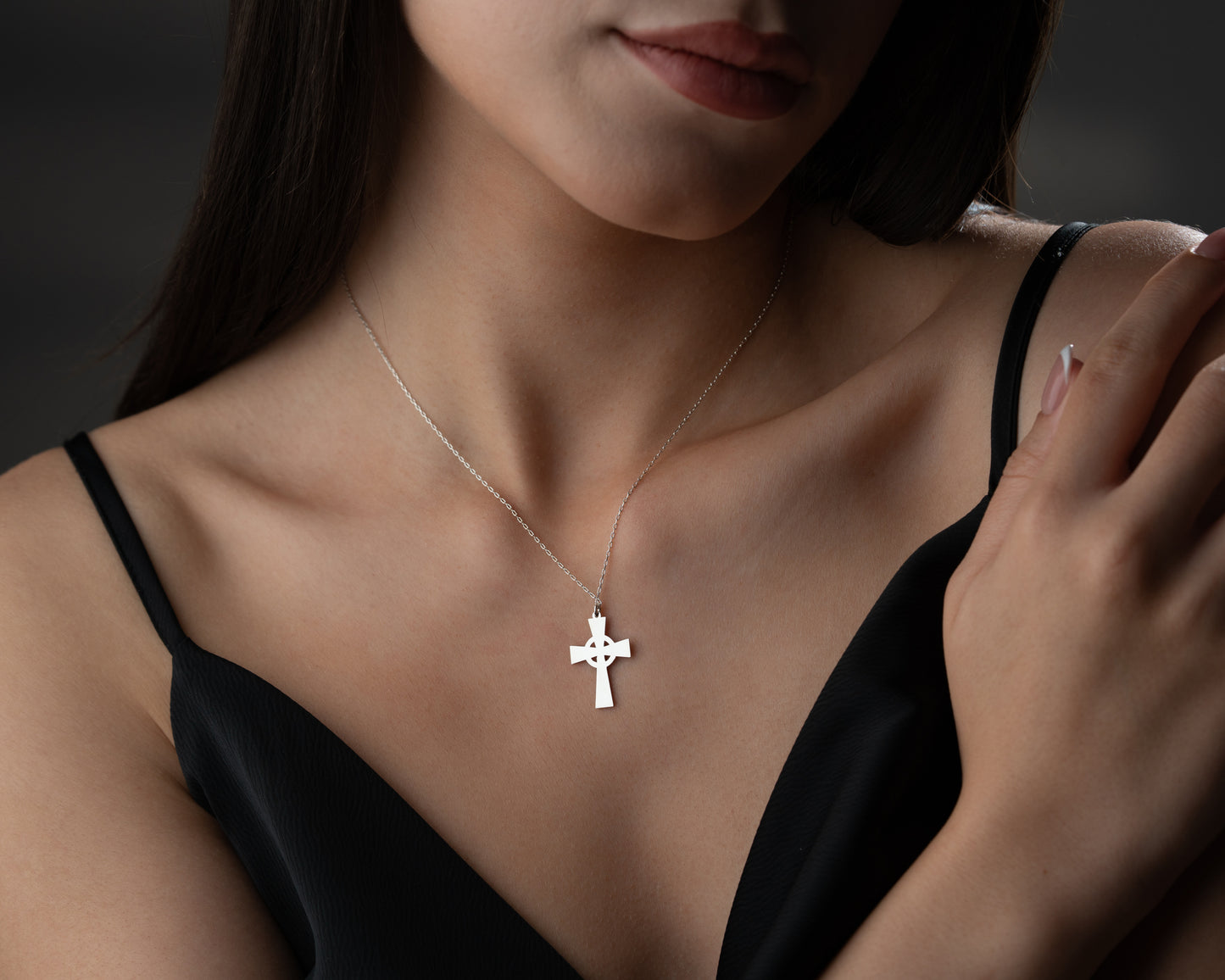 Celtic cross necklace on model