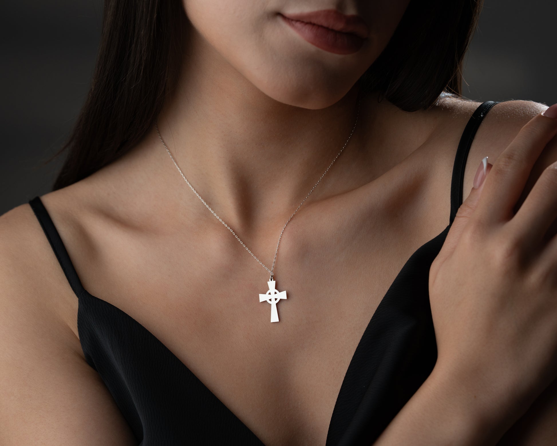 Celtic cross necklace on model