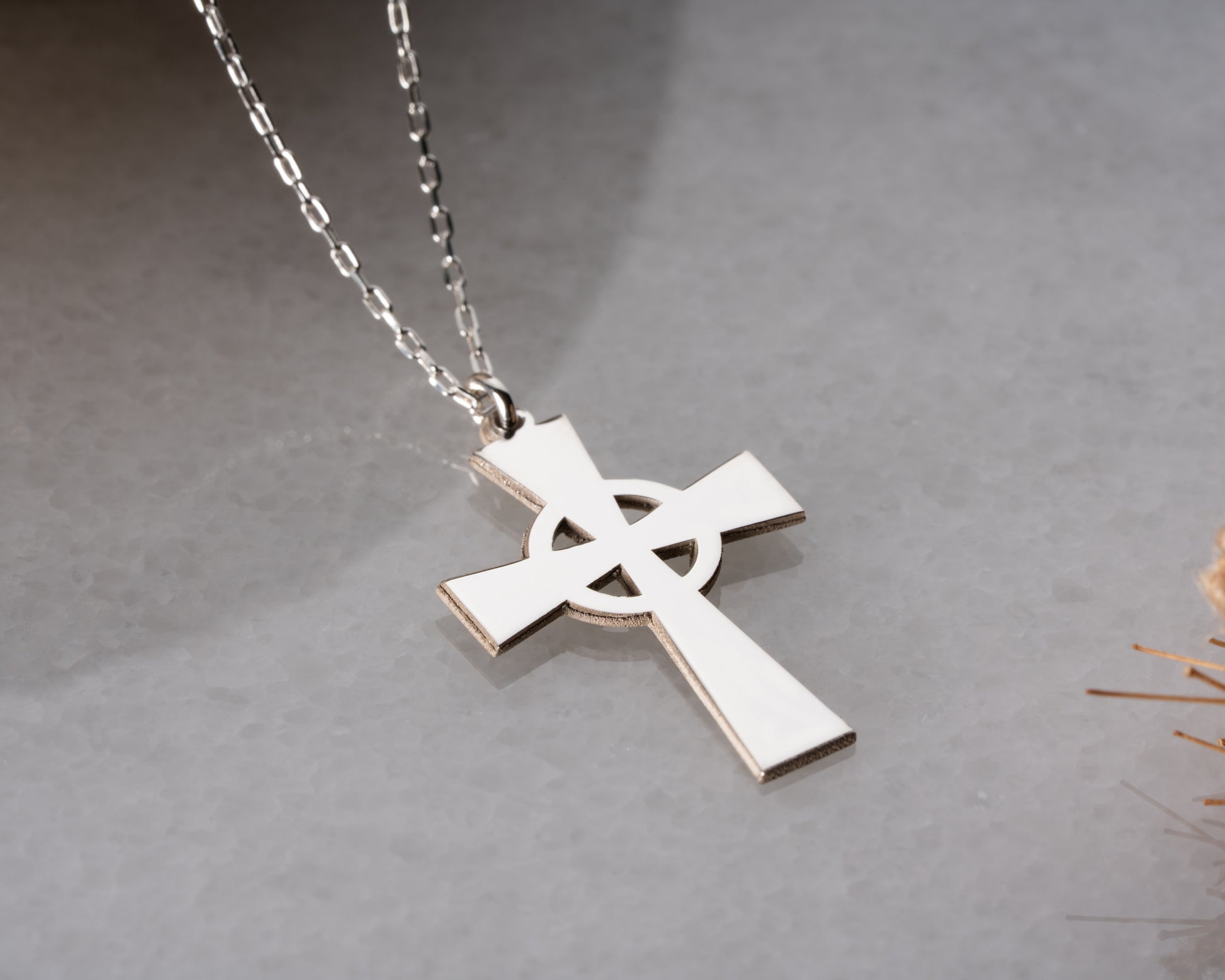 Circle cross necklace detail