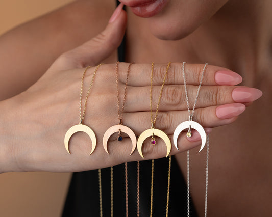 Crescent birthstone necklace in multiple finishes