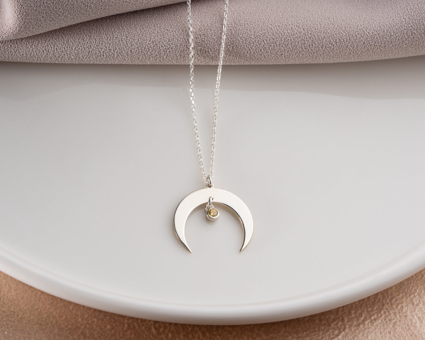 Crescent moon necklace lifestyle photo