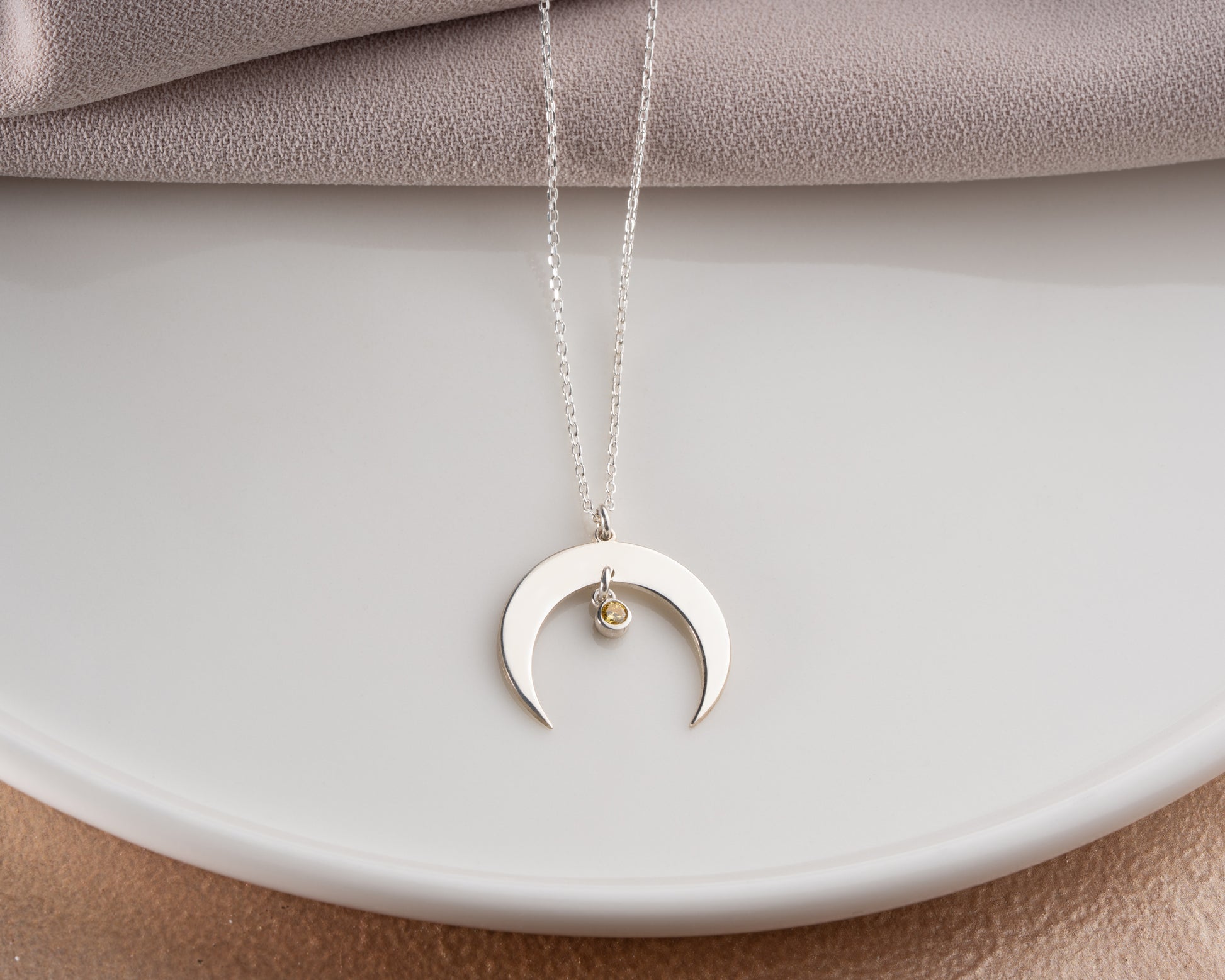 Crescent moon necklace lifestyle photo