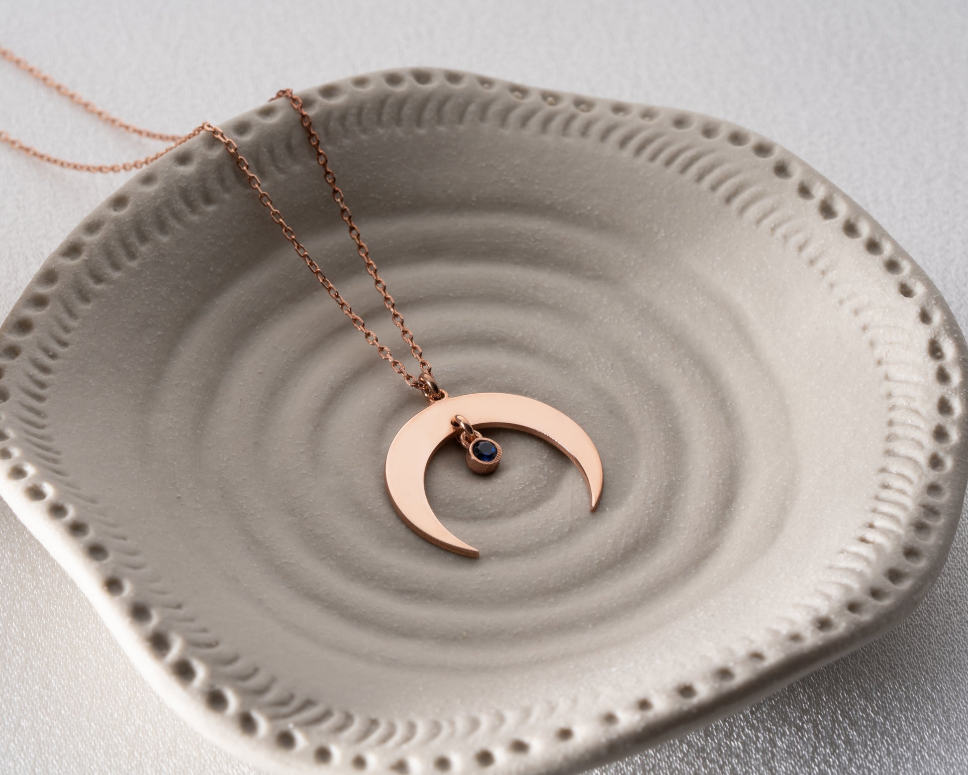 Crescent birthstone necklace product photo