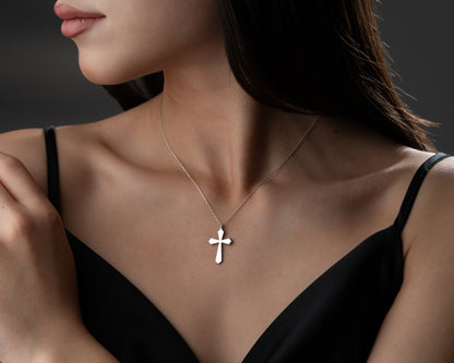Cross necklace on model
