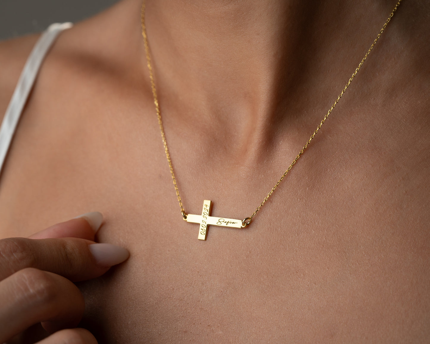Engraved name and date cross necklace