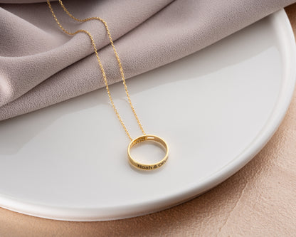 Engraved ring pendant necklace on model