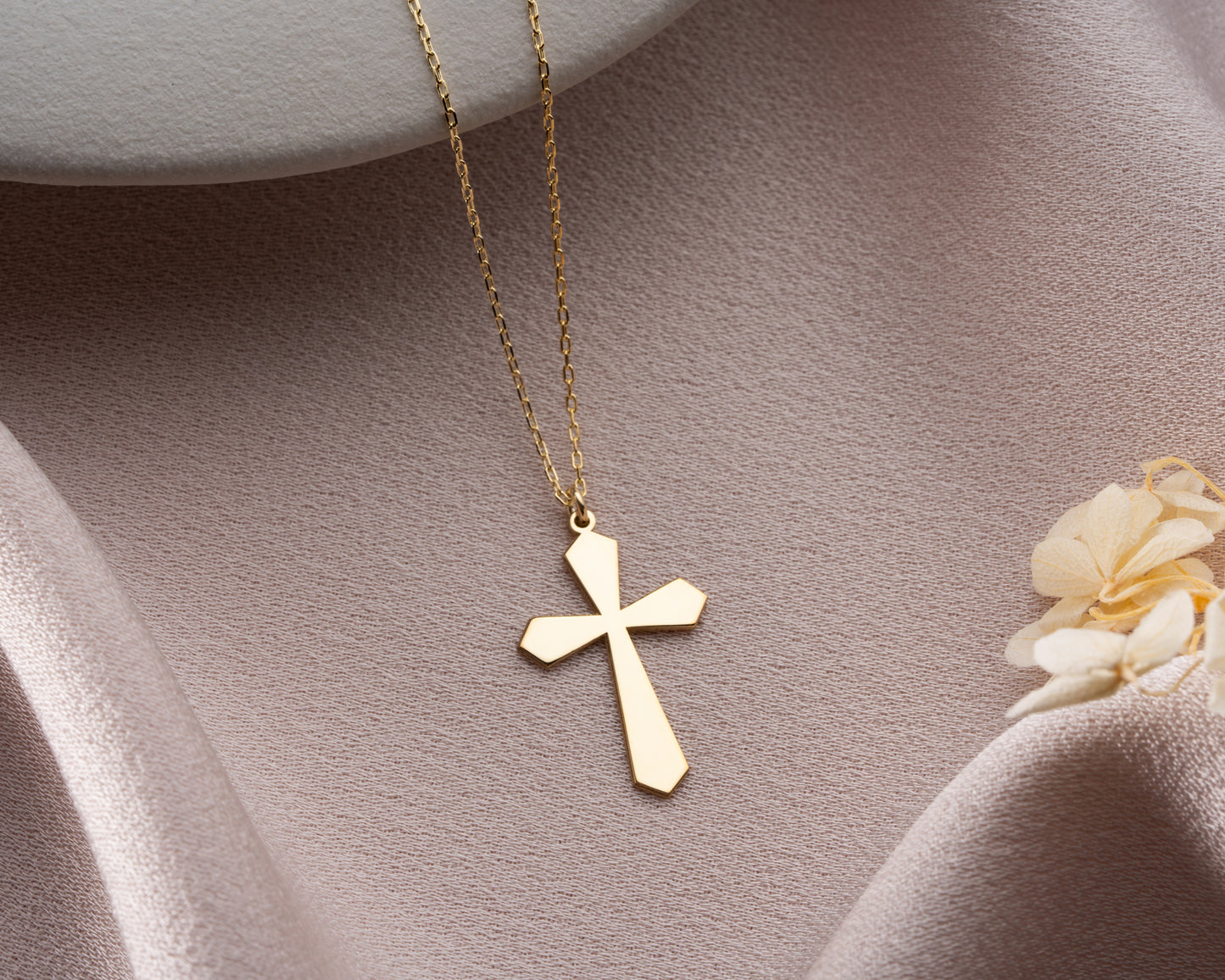Flared cross pendant finishes