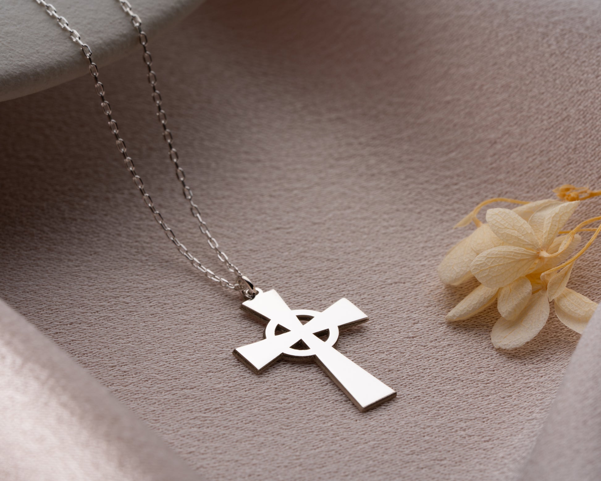 Geometric cross pendant detail