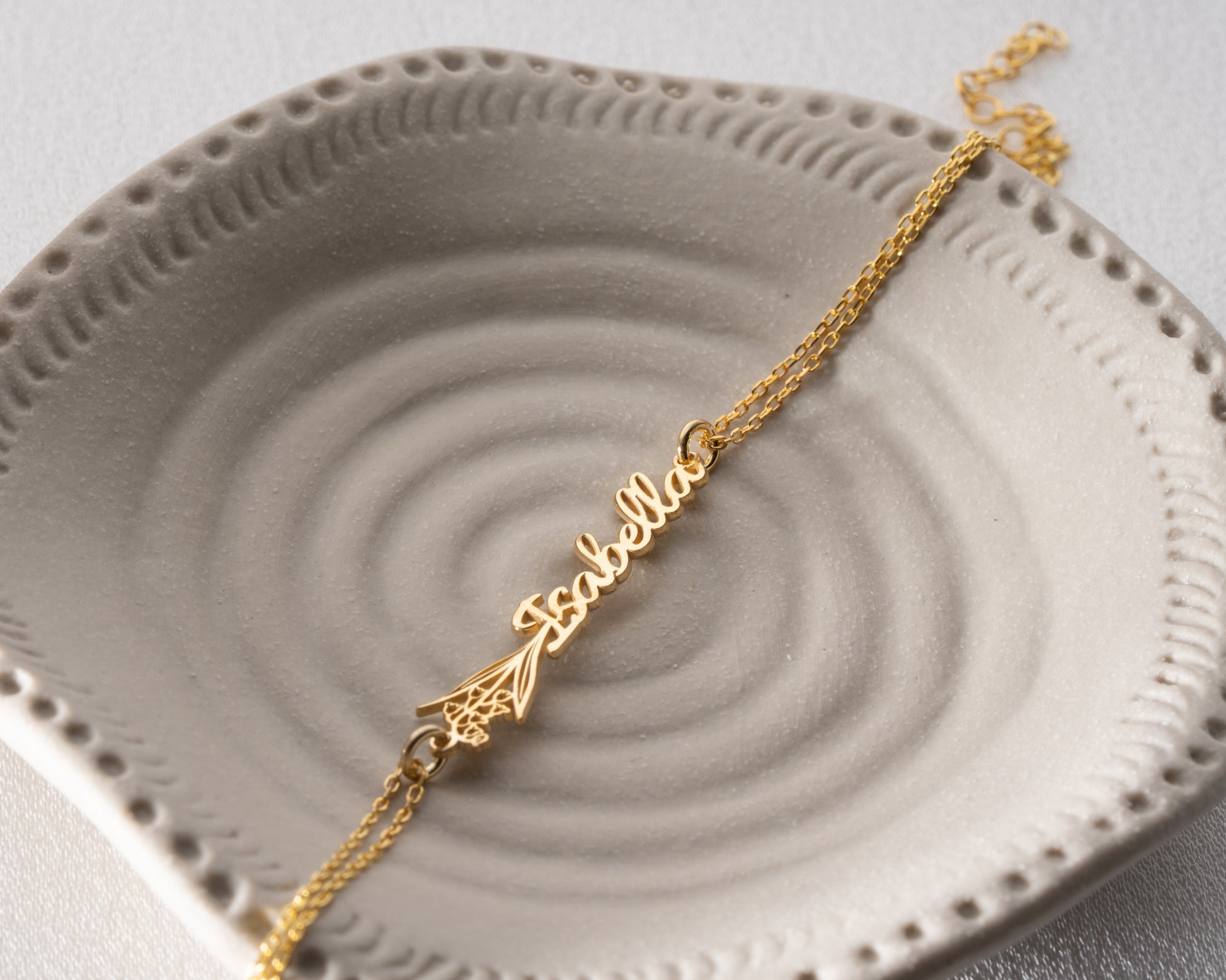 gold birth flower bracelet