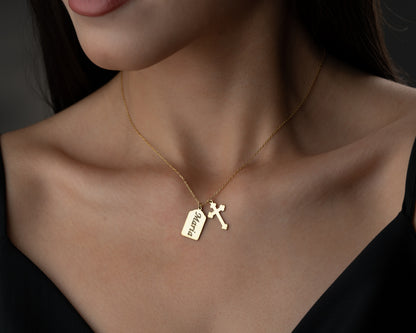 Gold personalized name cross necklace worn by model