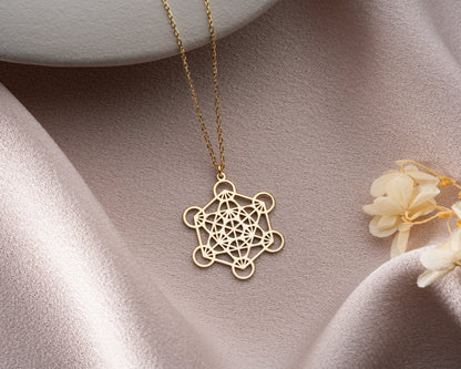 Gold Metatron's cube necklace close-up