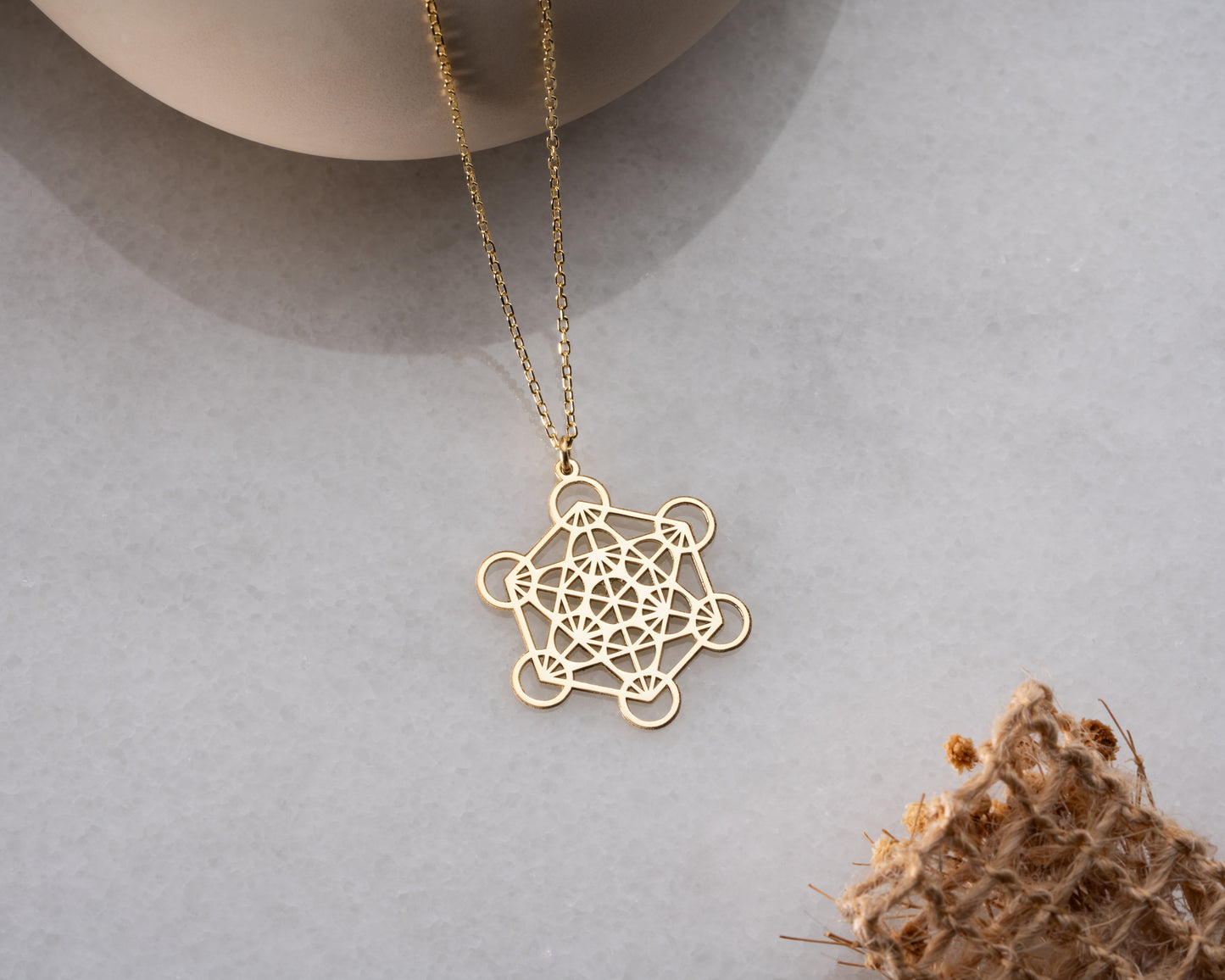 Gold Metatron's cube necklace