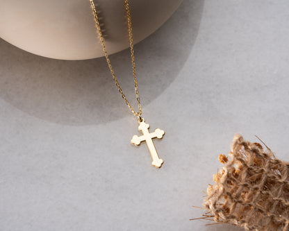 Gold trefoil cross pendant