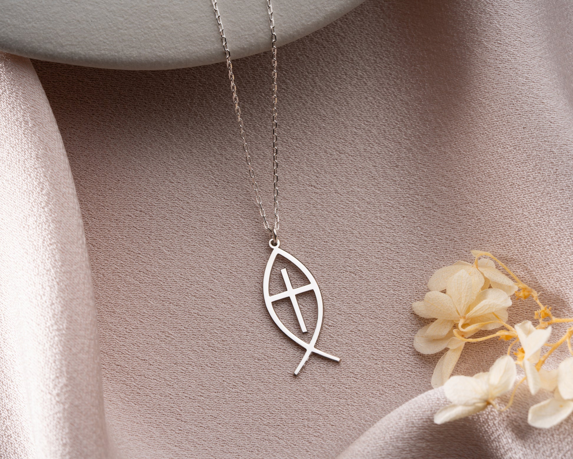 Ichthys cross close up