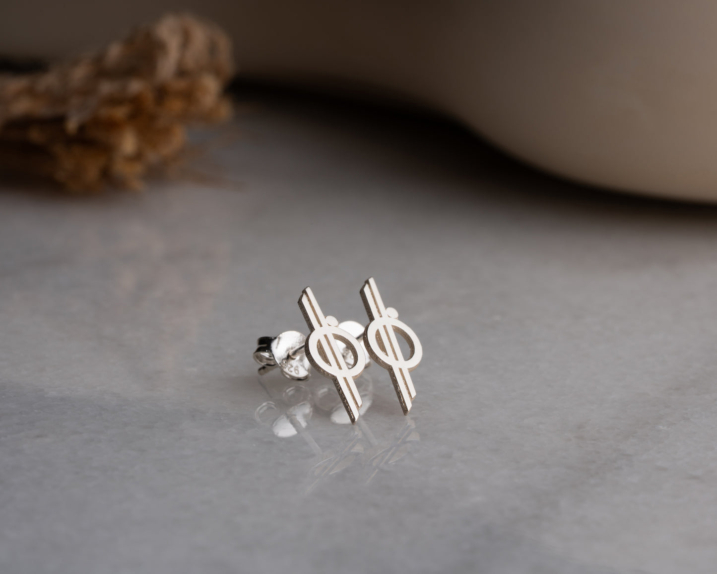 Minimalist orbit symbol stud earrings