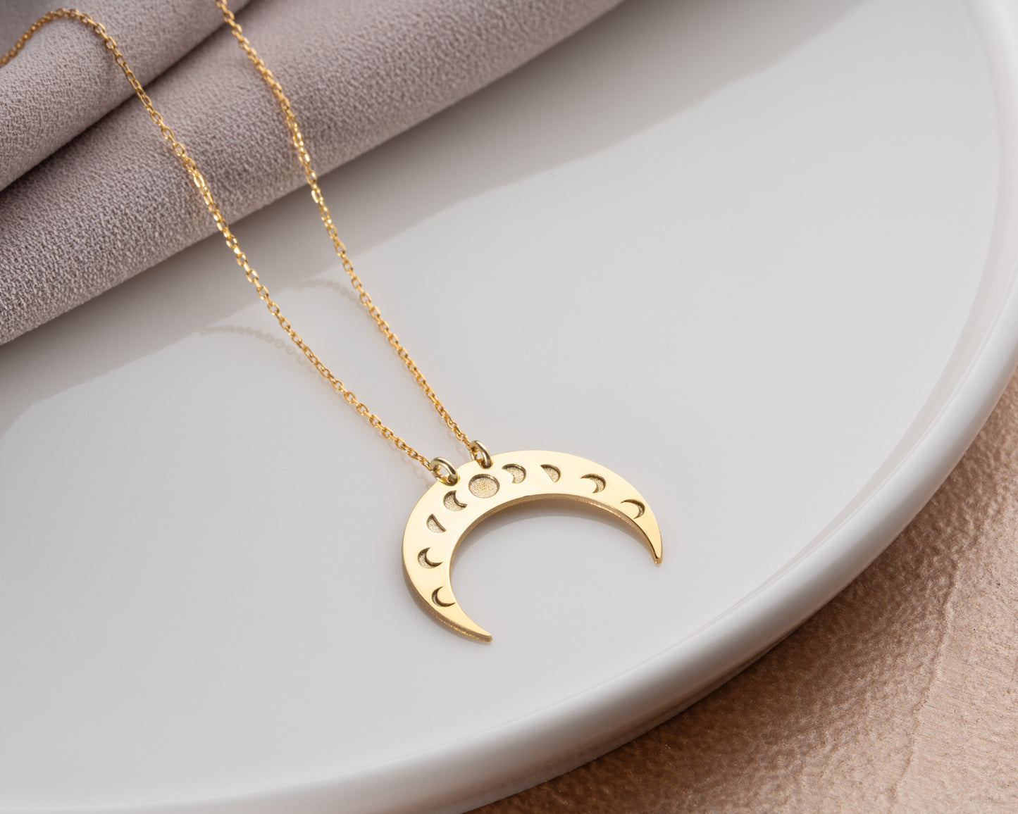 Moon phase necklace lifestyle photo