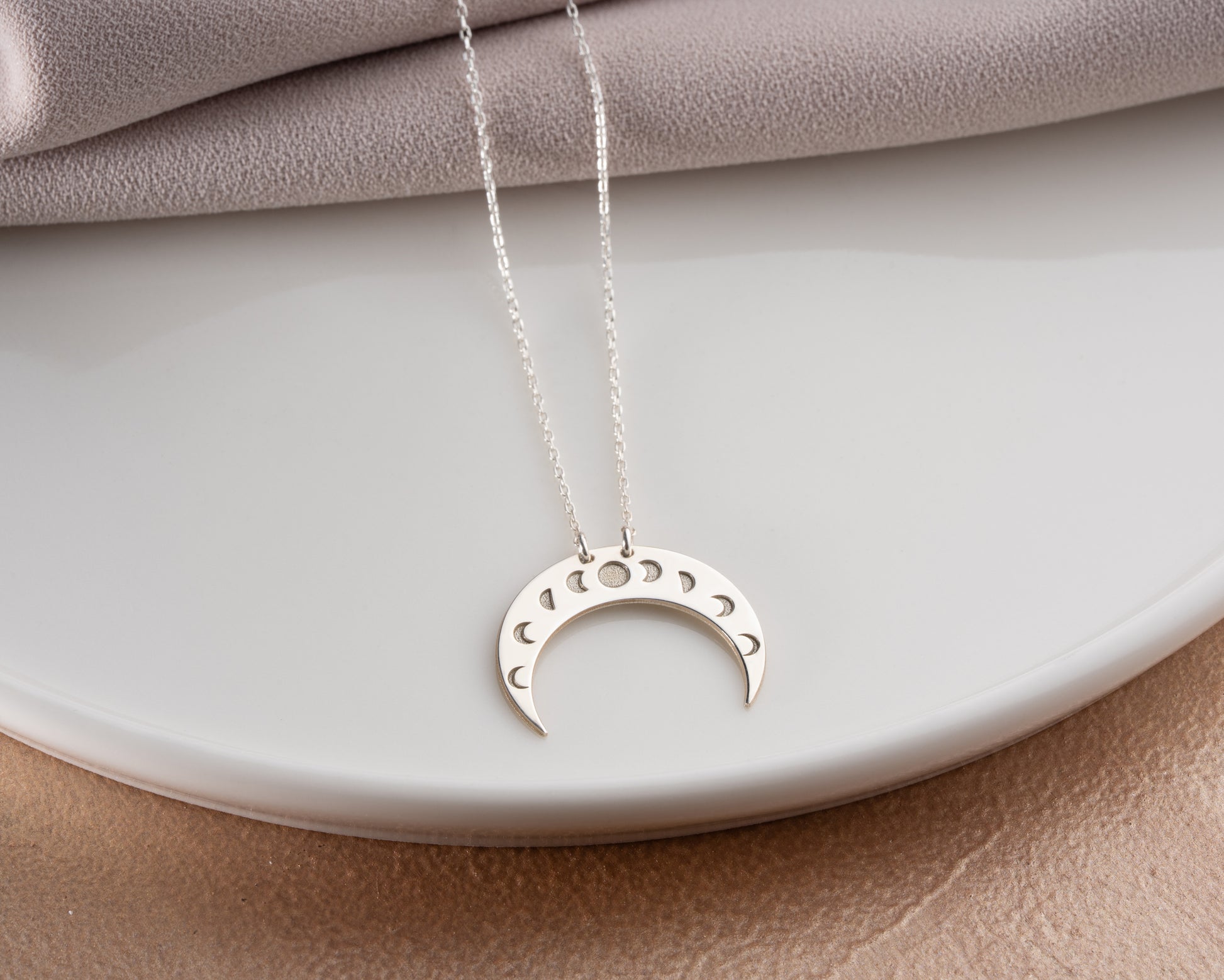 Moon phase crescent pendant detail