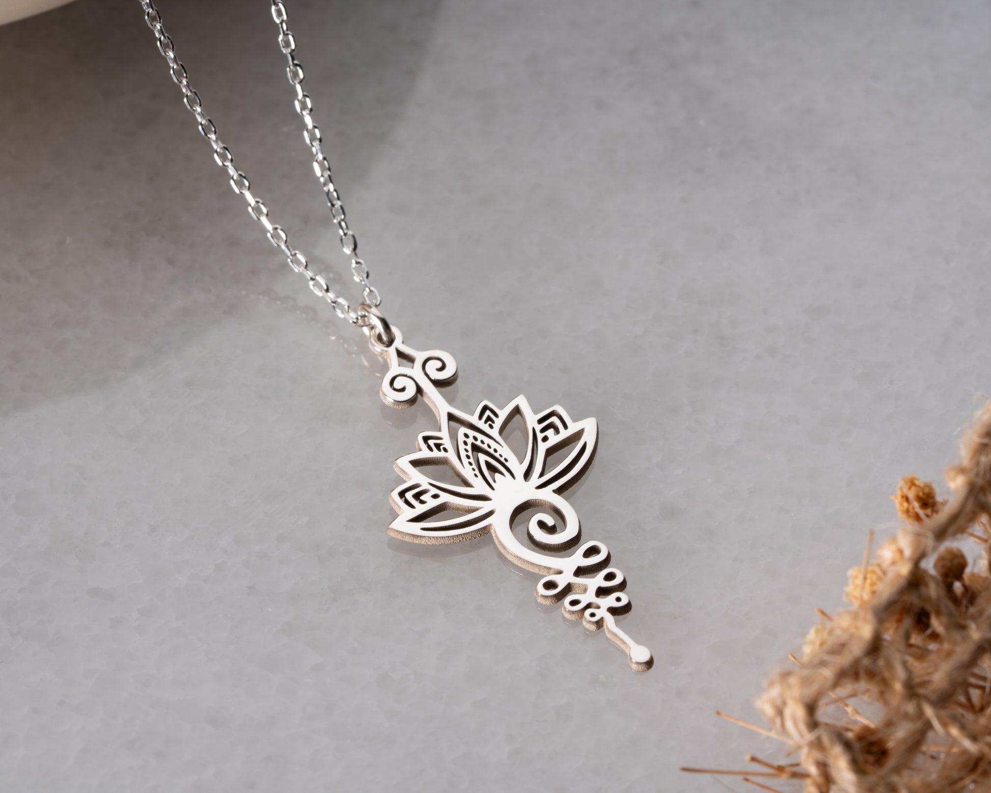 Ornate lotus necklace detail