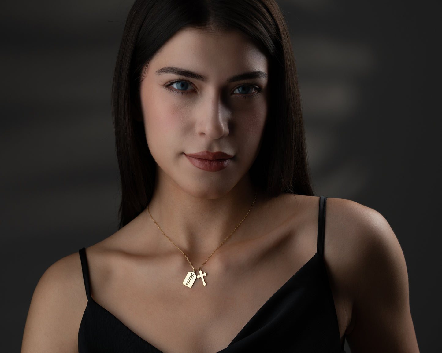 Gold personalized Christian name necklace on model