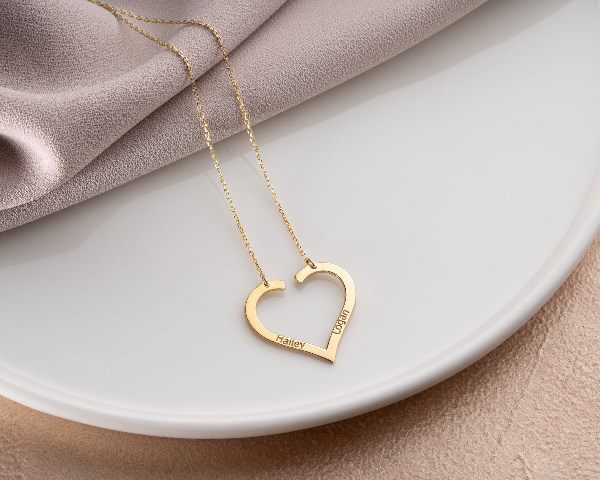 Personalized heart necklace on model