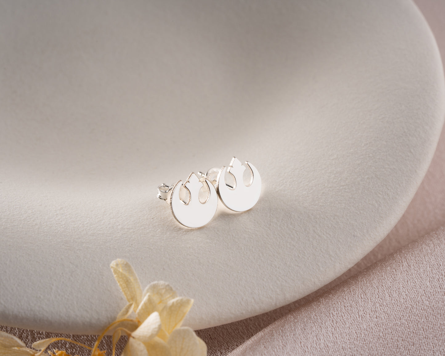 Rebel emblem earrings side detail