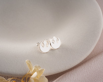 Rebel emblem earrings side detail
