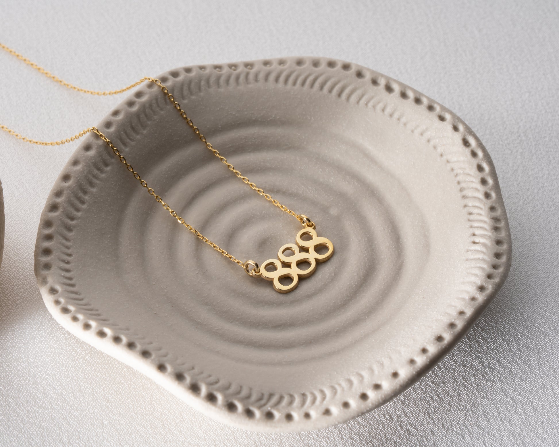 Repeating number pendant