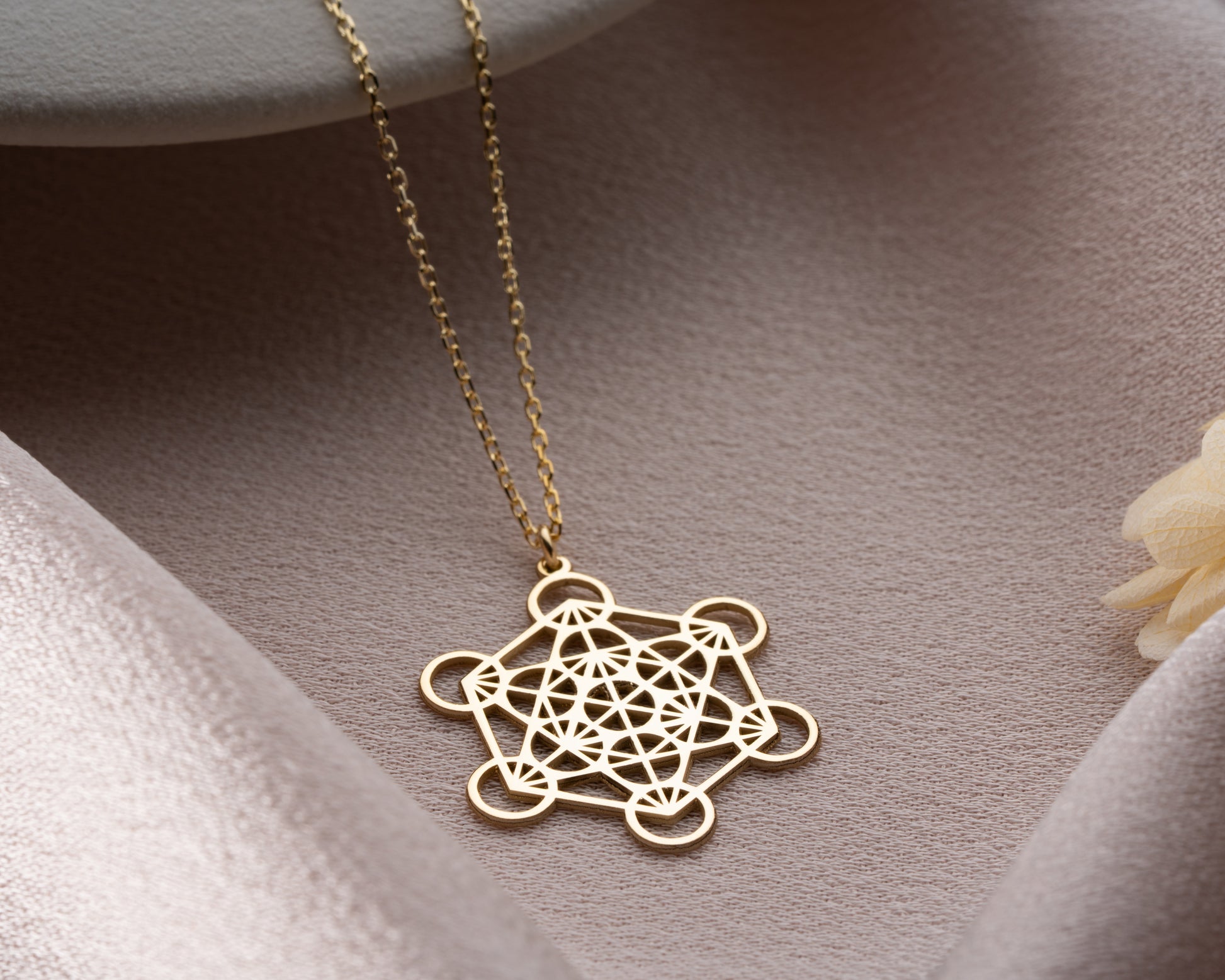 Silver Metatron's cube necklace close-up