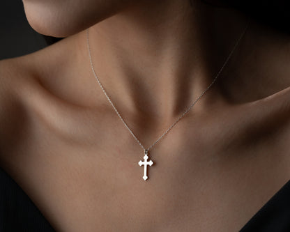 Silver trefoil cross necklace on model