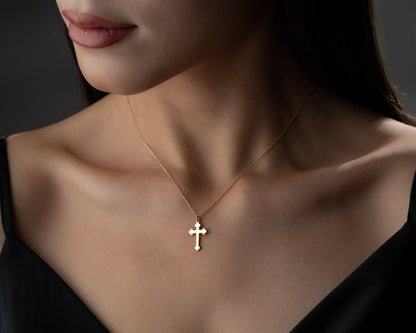 Gold trefoil cross necklace portrait